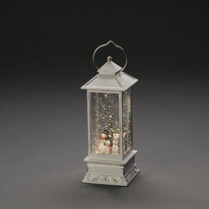 Vattenfylld lykta vit snögubbe