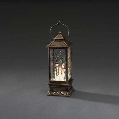 Vattenfylld lykta snögubbe